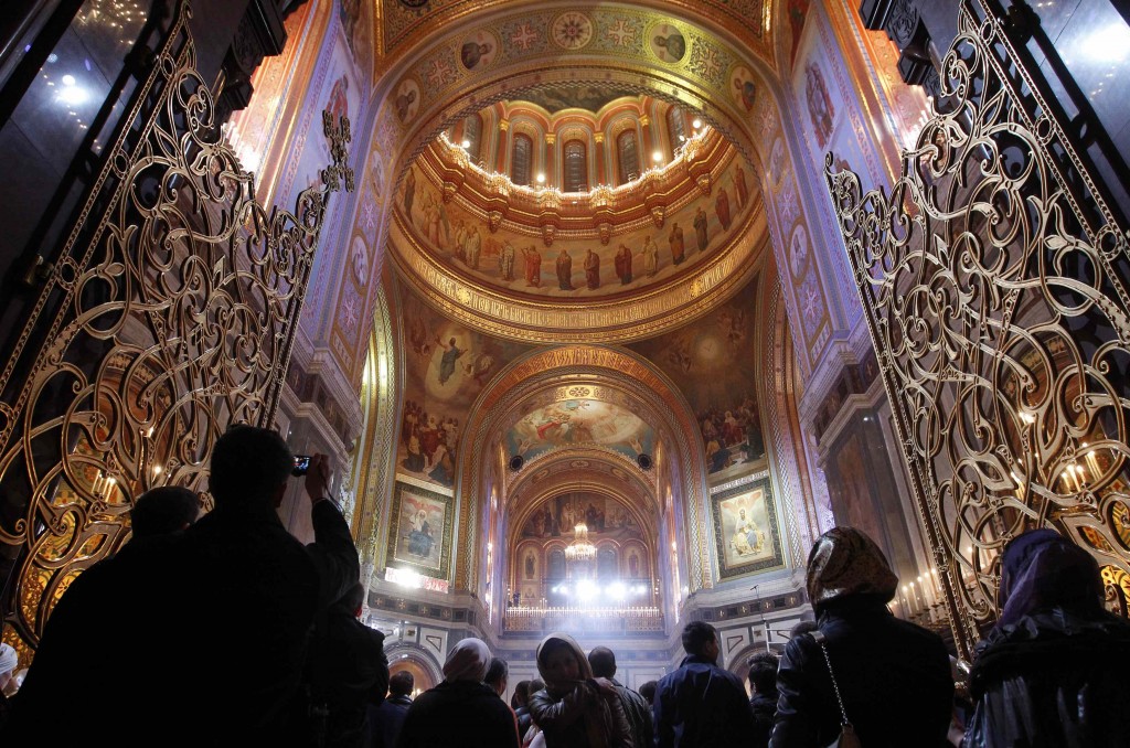 Worshippers attend an Orthodox Easter service conducted by the Patriarch of Moscow and All Russia Kirill in the Christ the Saviour Cathedral in Moscow