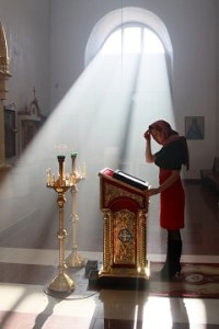 a woman at prayer